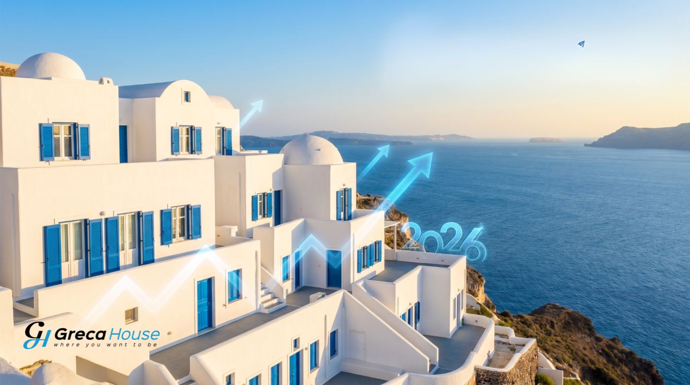 Παραθαλάσσιες κατοικίες κυκλαδίτικης αρχιτεκτονικής με θέα στο Αιγαίο και ανοδικά γραφήματα αγοράς, για άρθρο της Greca House σχετικά με την αγορά σπιτιού στην Ελλάδα το 2026.